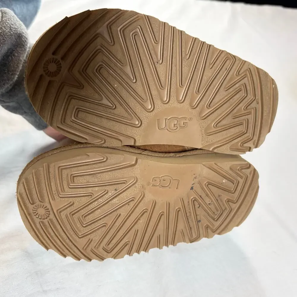 UGG Toddler Gita chestnut boots.  Front bow pom-poms.  Size 8T. Worn once